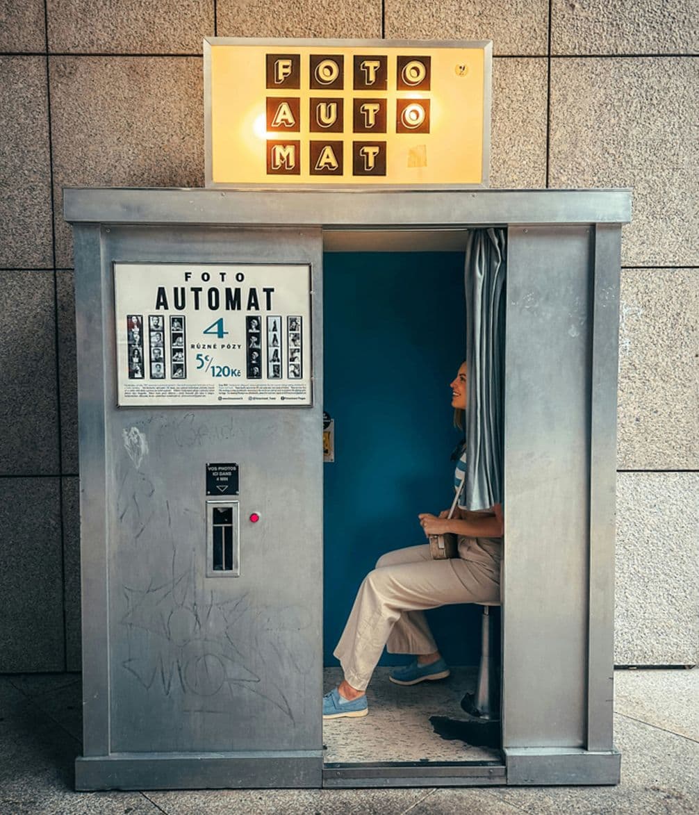 Person smiling in photo booth
