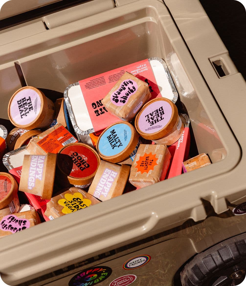 Tub of colourful ice cream pots and sandwiches