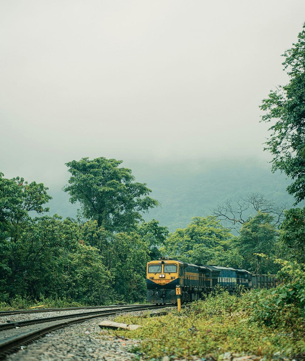 The Mandovi Express in Goa with mist on mountains