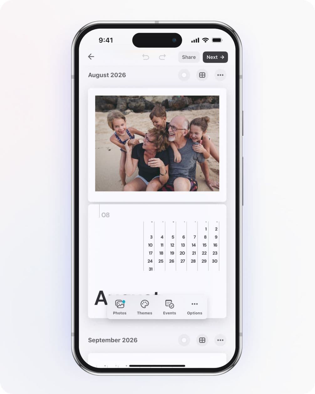 Smartphone displaying a calendar app for August 2026, featuring a family photo with four children and two adults on a beach.