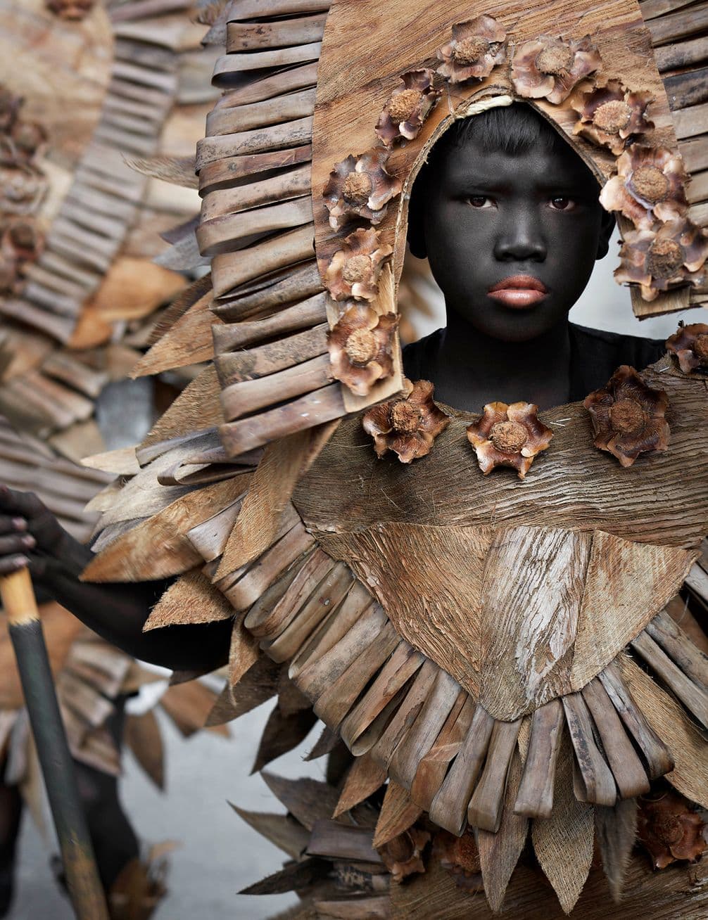 Boy in Philippines with a costume made from wood