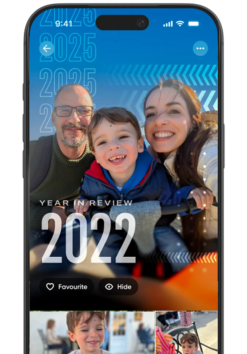 A smartphone display showing a "Year in Review 2022" collage, featuring a smiling family of three in the main photo with smaller images below.