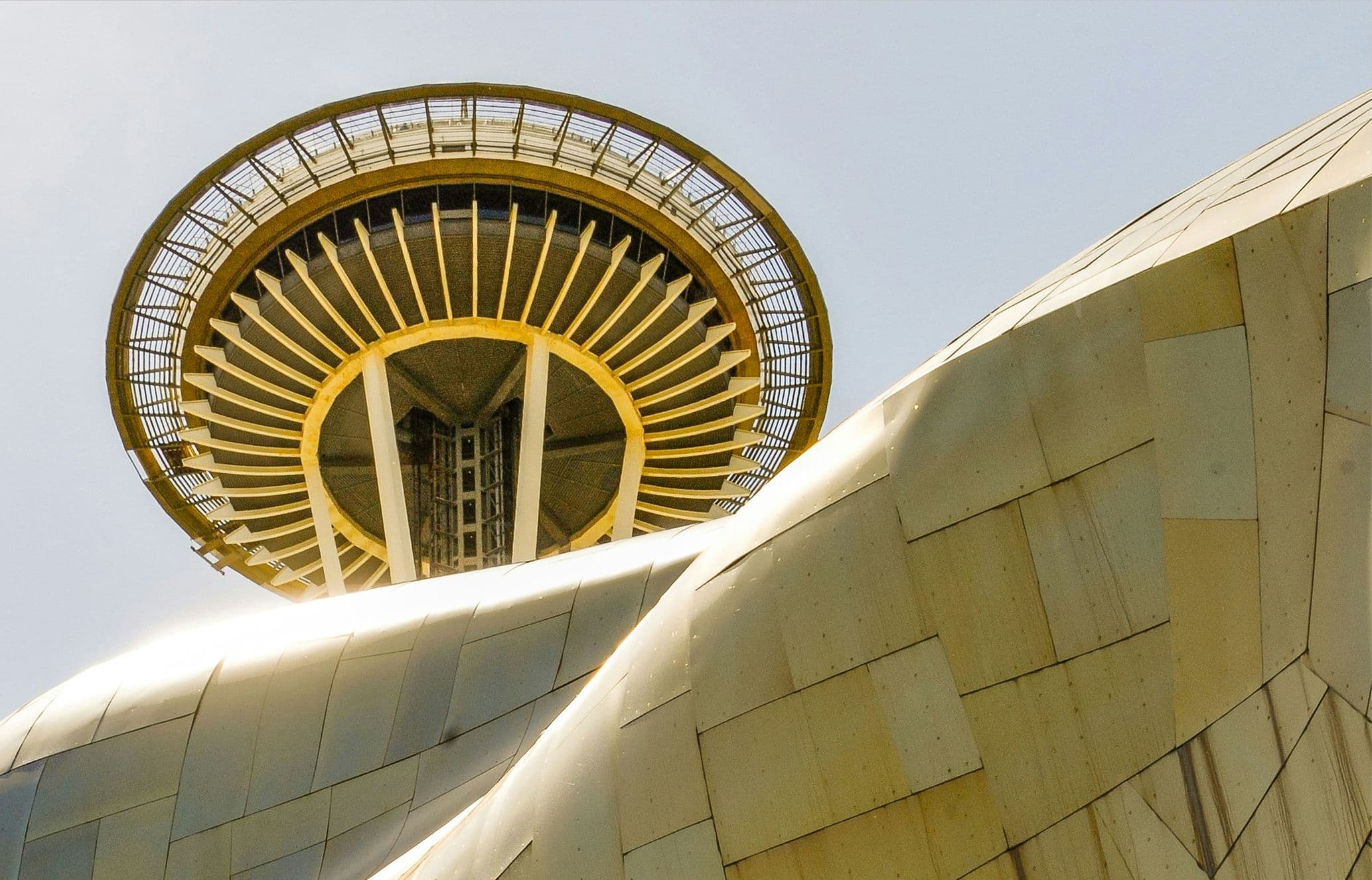 Seattle Space Needle framed against the Museum of Pop Culture
