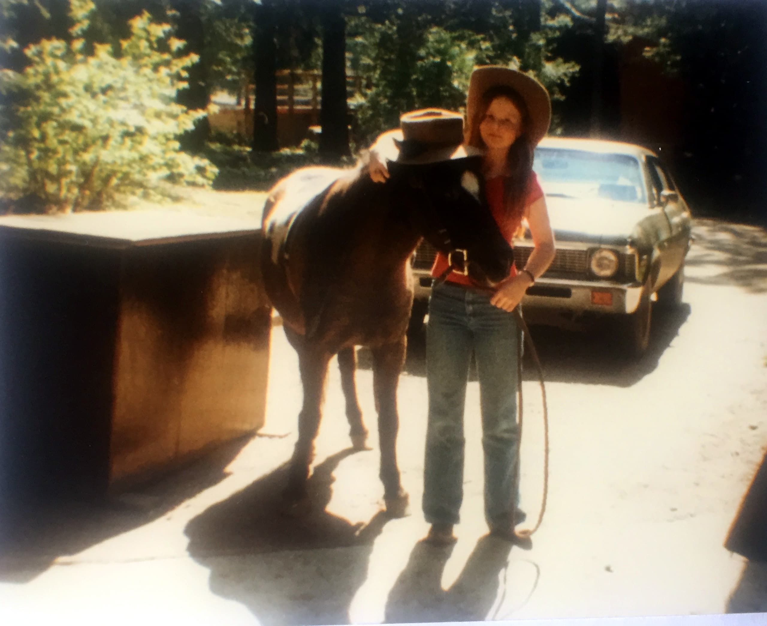 Staci Layne Wilson, 11, dressed as a cowgirl with her pony, Smokey