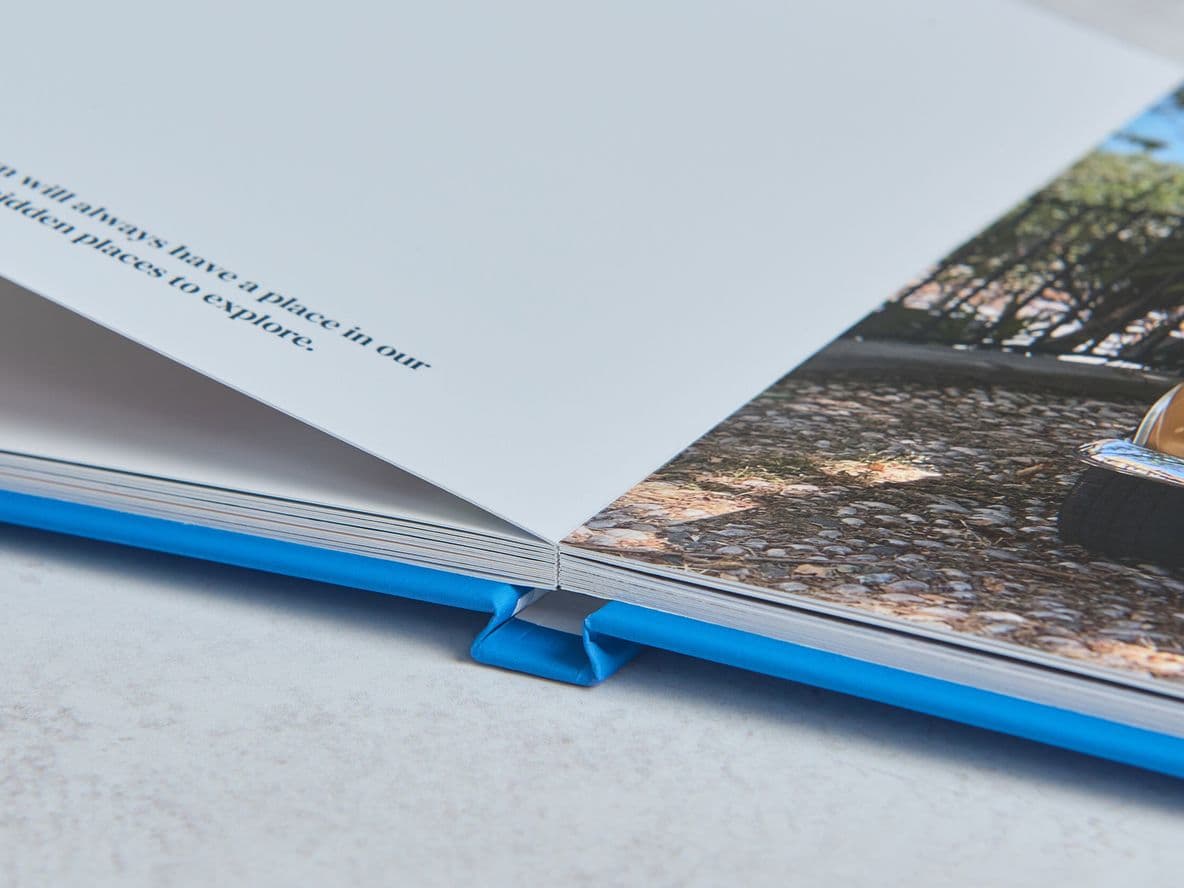 layflat photo book with a text only and full bleed image layout
