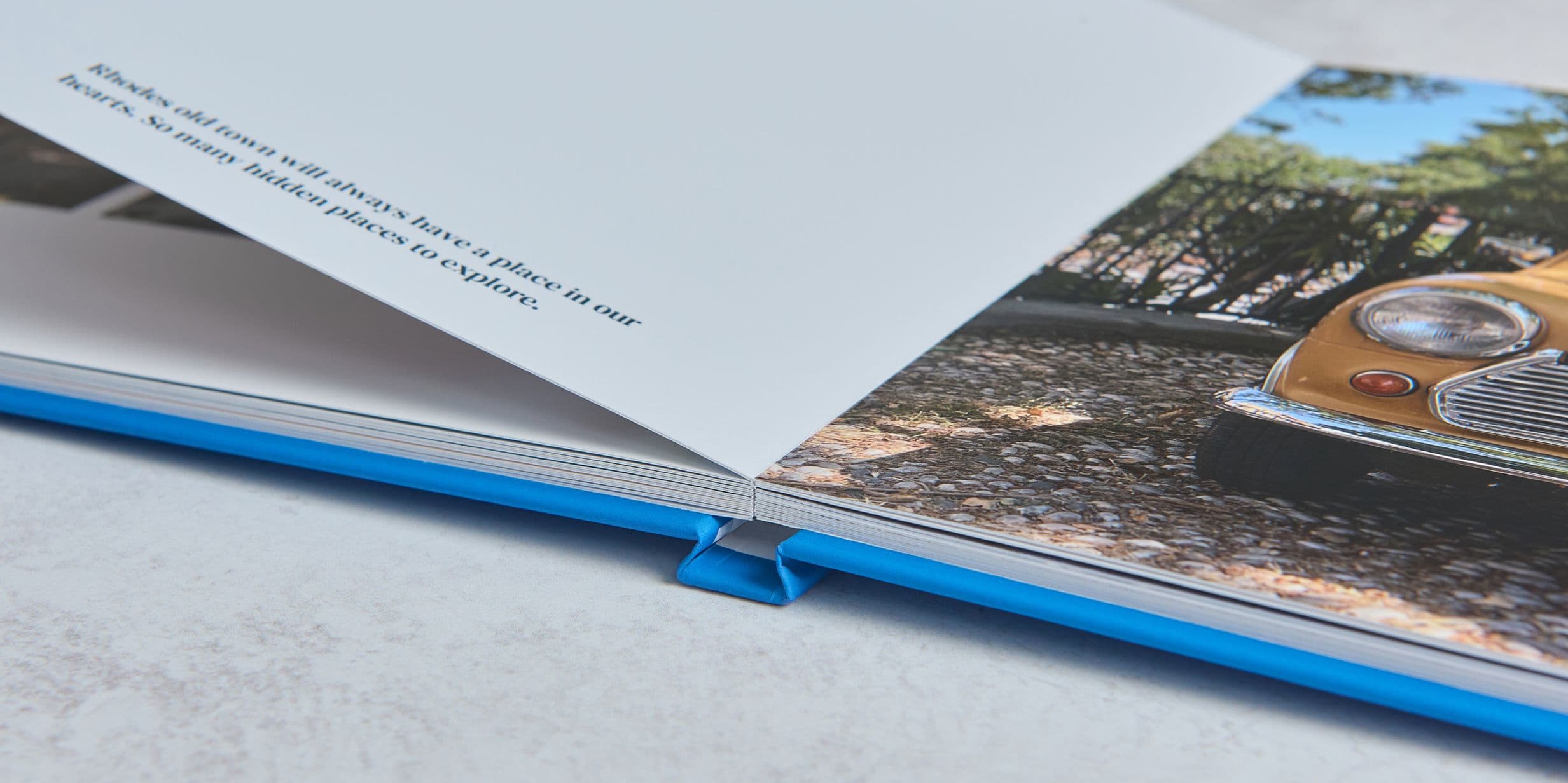 layflat photo book with a text only and full bleed image layout