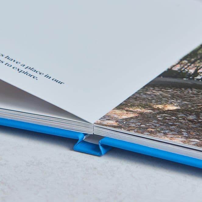 layflat photo book with a text only and full bleed image layout