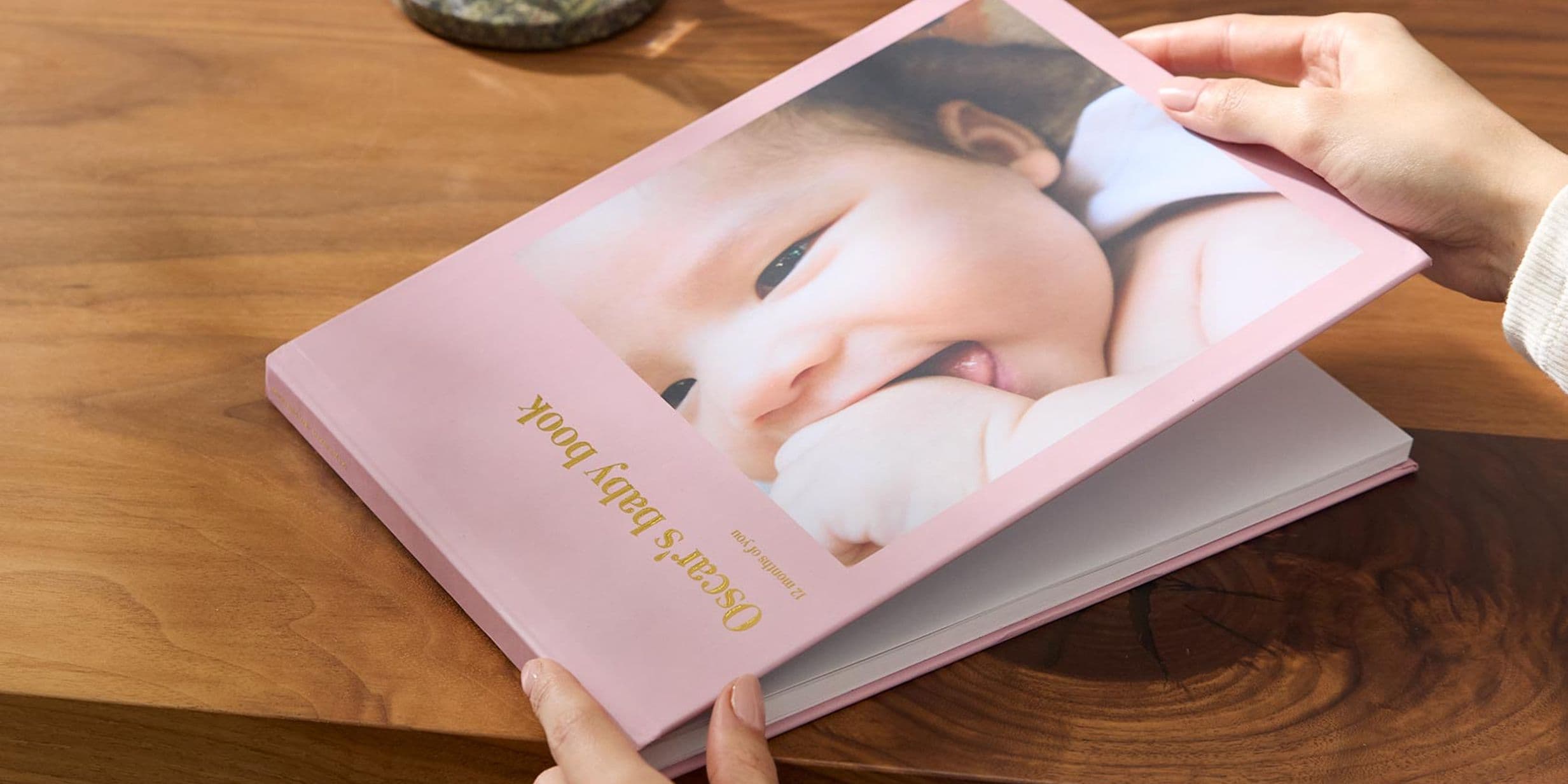 Personalised hardcover photo book of baby's first year