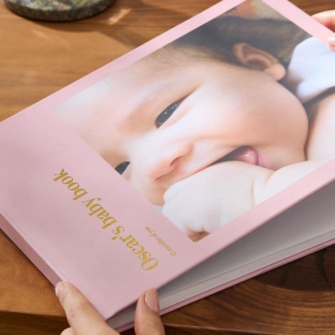 Personalised hardcover photo book of baby's first year