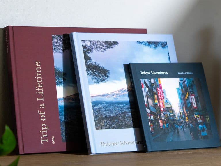 A collection of personalised travel photo books of a trip to Japan