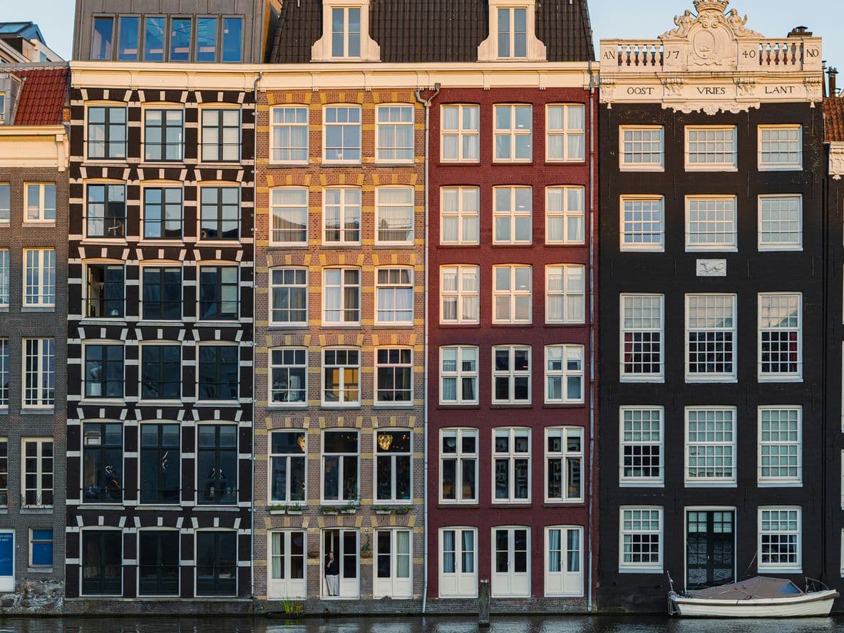 Houses along the canal in Amsterdam captured at sunrise