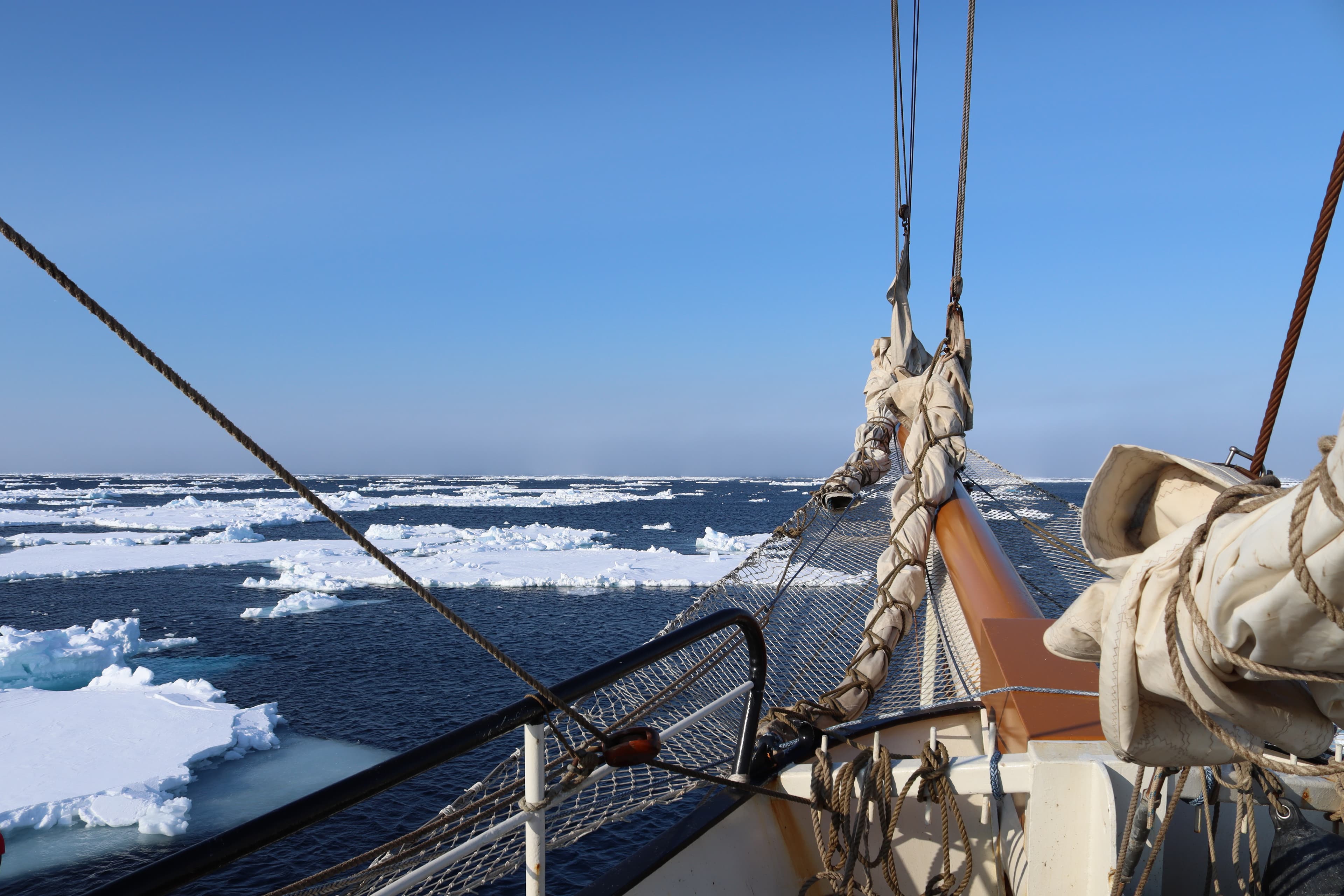 The Antigua tall ship 7945 degrees North surrounded by ice floes in the sea