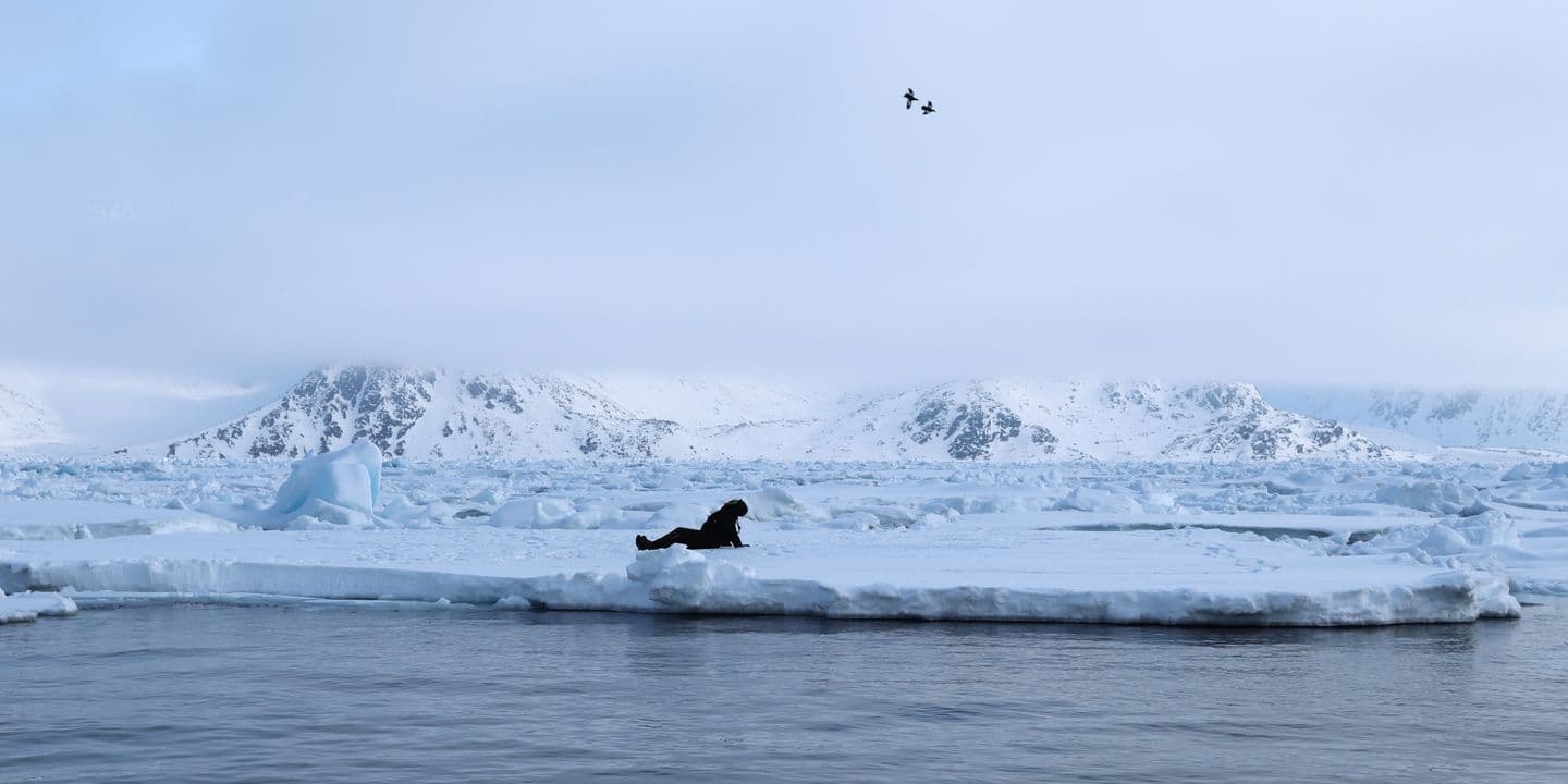 Writer and poet Katie Hale sat on an ice floe