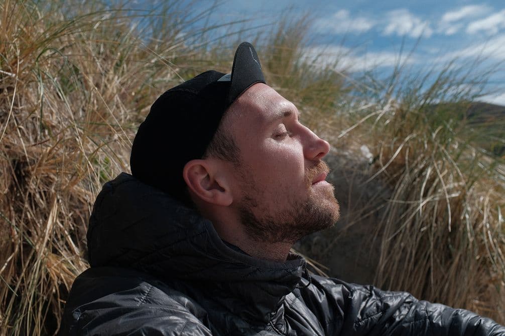 Adam enjoying the sun hiding in the sand banks of Calgary Beach, Mull after a morning of headwind_Liz Seabrook_6