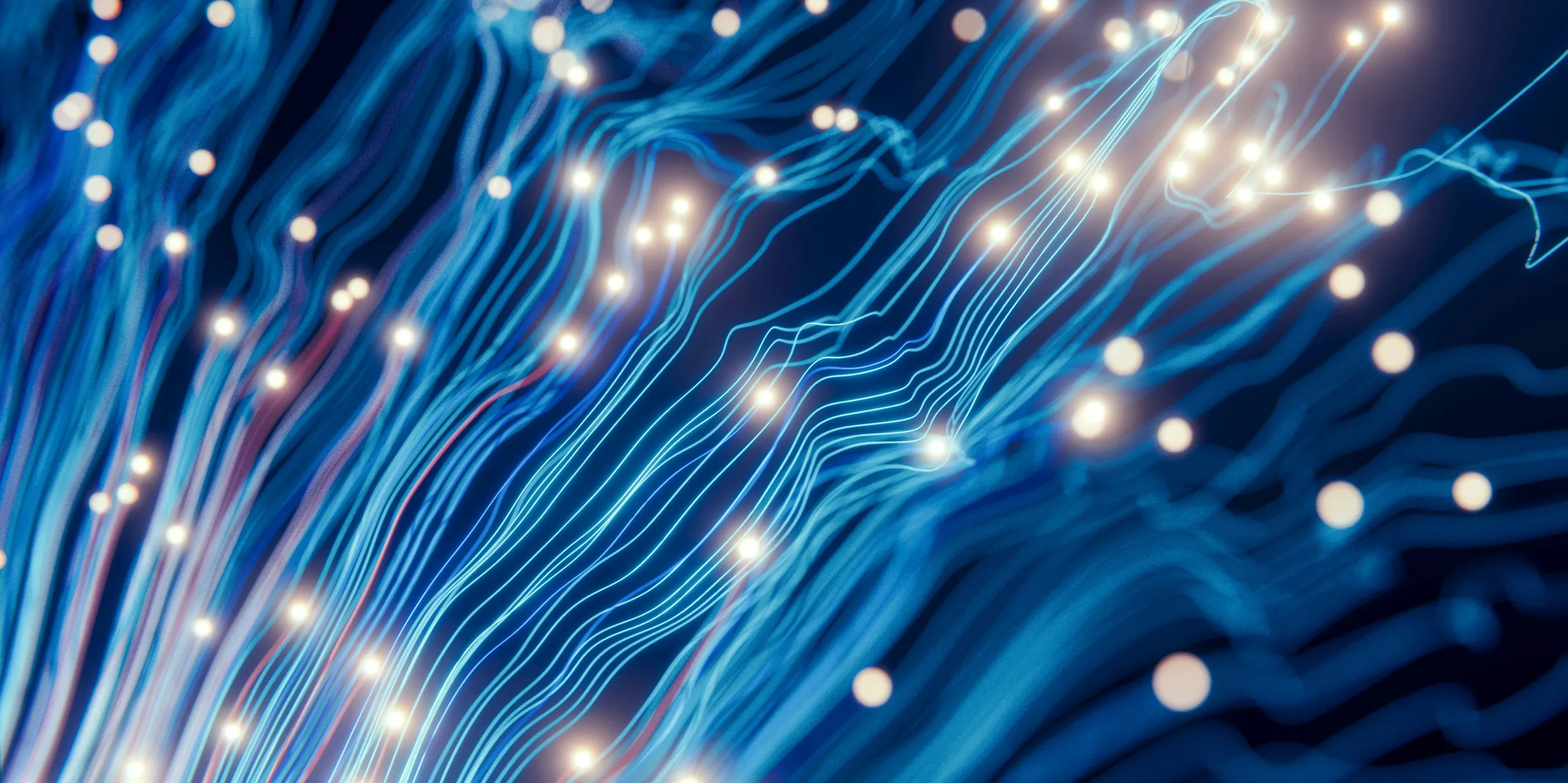 Abstract blue wavy lines resembling data cables or neural pathways, interspersed with bright glowing dots on a dark background.