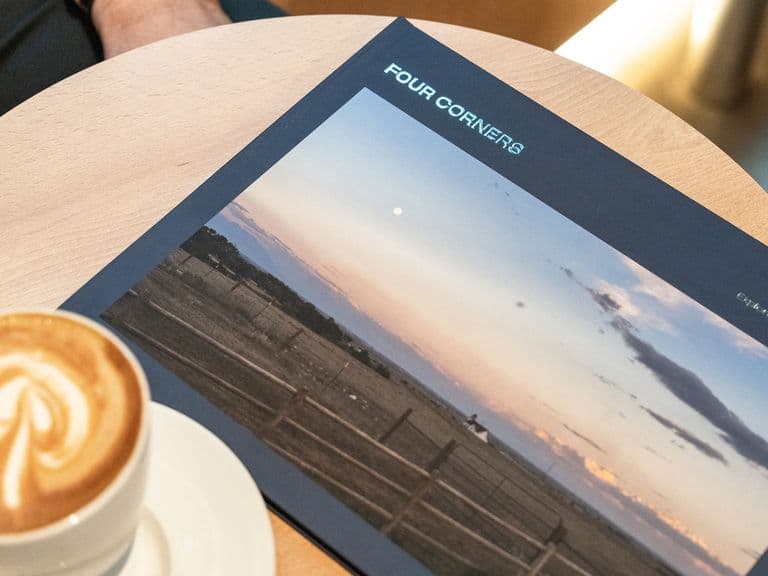 California road trip photo book with coffee