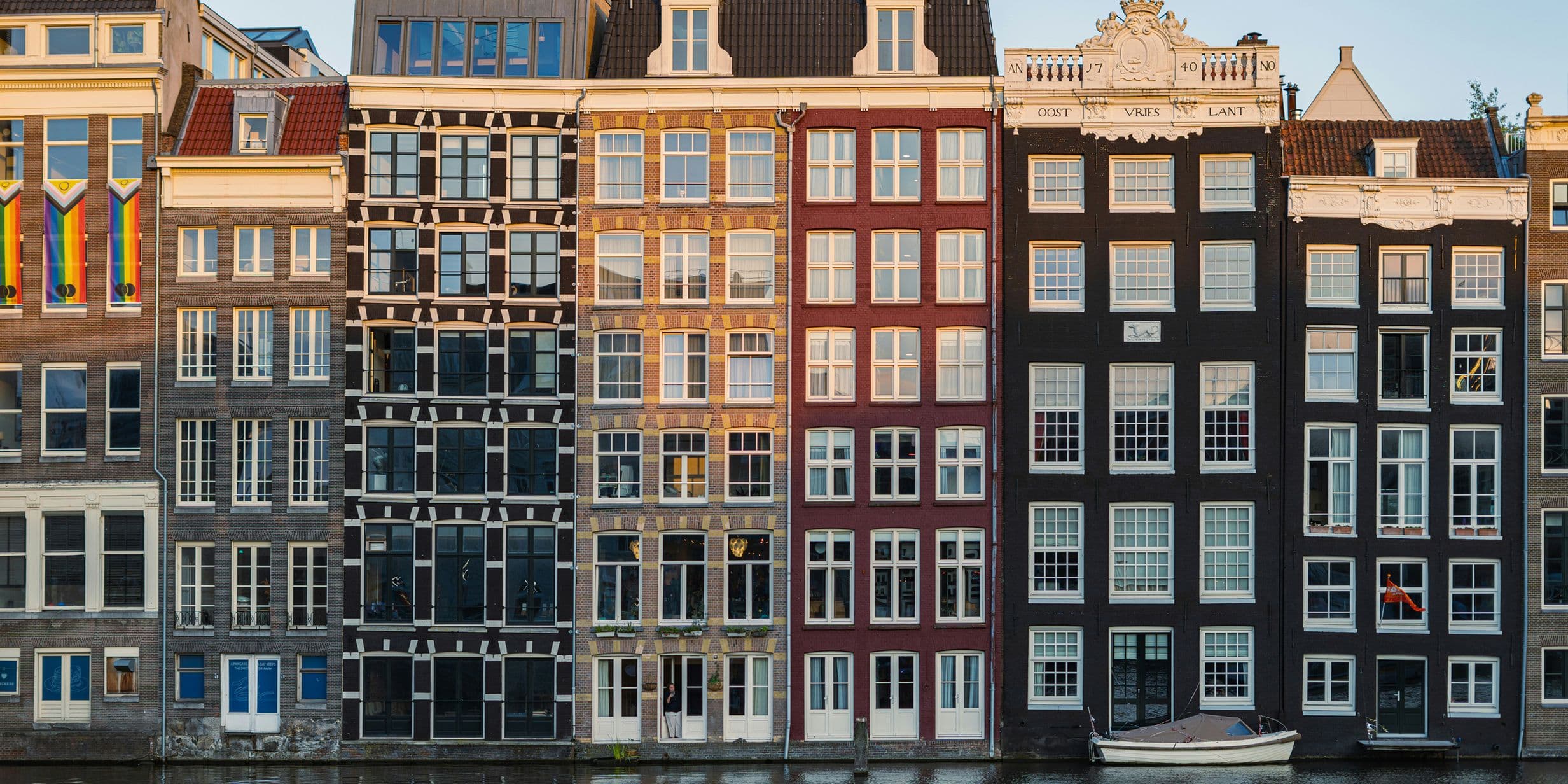 Houses along the canal in Amsterdam captured at sunrise