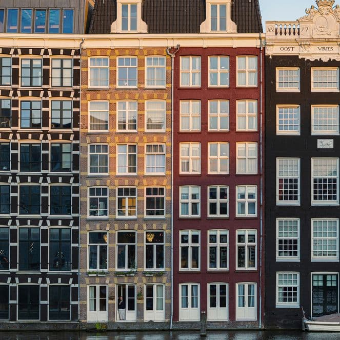 Houses along the canal in Amsterdam captured at sunrise