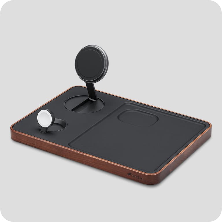 A sleek, multi-device charging station with wooden edges, featuring slots for a smartphone, smartwatch, and earbuds on a gray background.