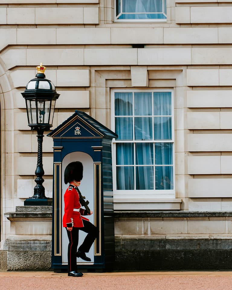 Solider on guard outside Buckingham Palace