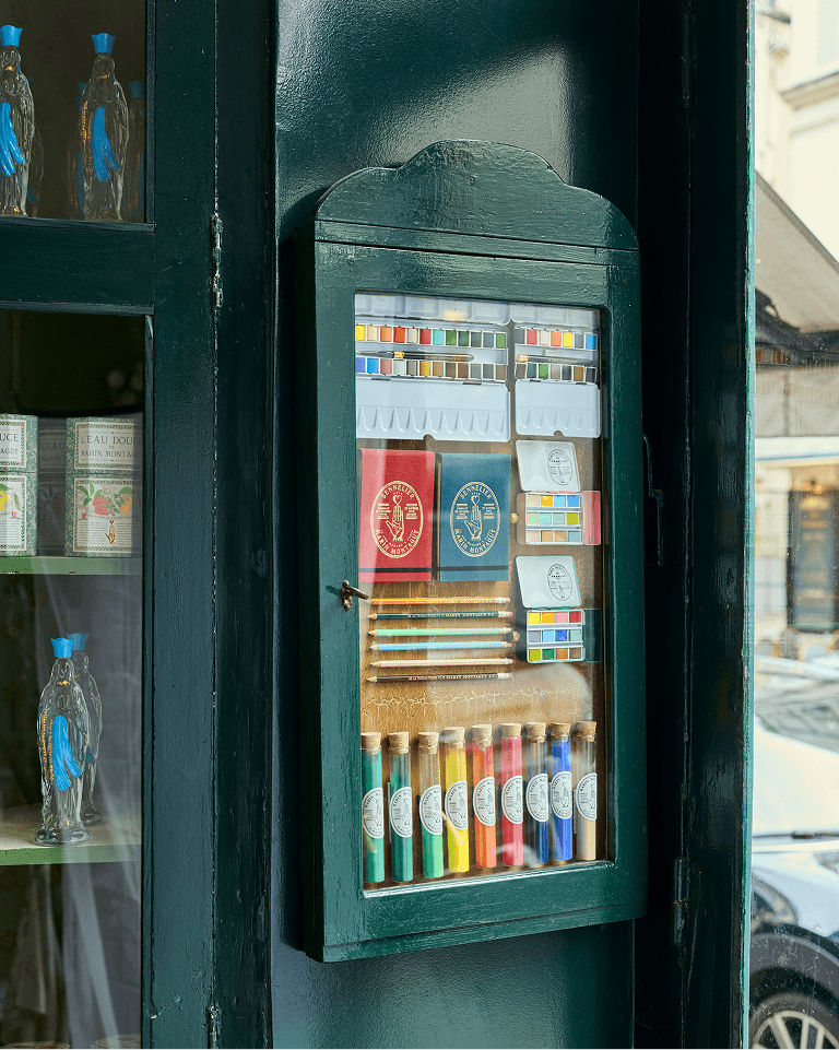 A box of watercolours, pencils and notebooks at Marin Montagut