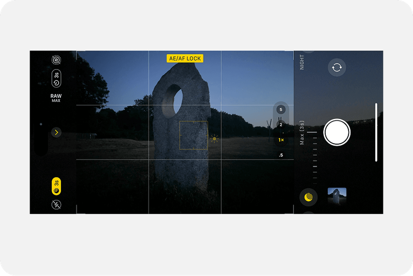 Smartphone camera interface capturing a large stone with a hole at dusk, featuring various settings and controls on the screen.
